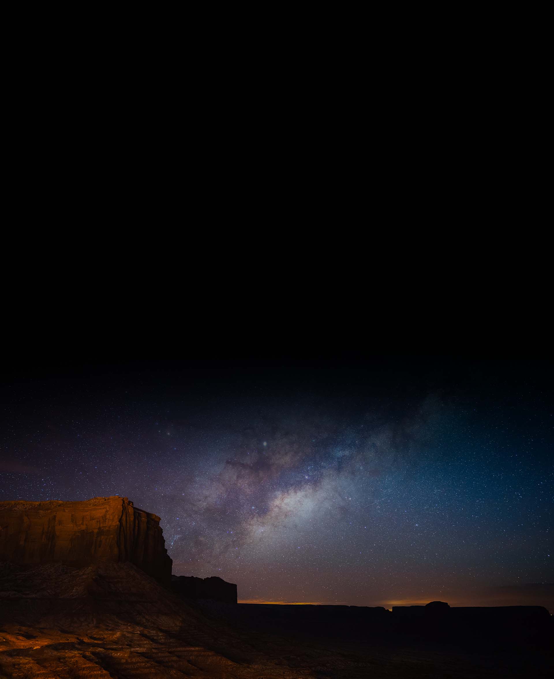 night sky with milky way and Utah red rock reversed