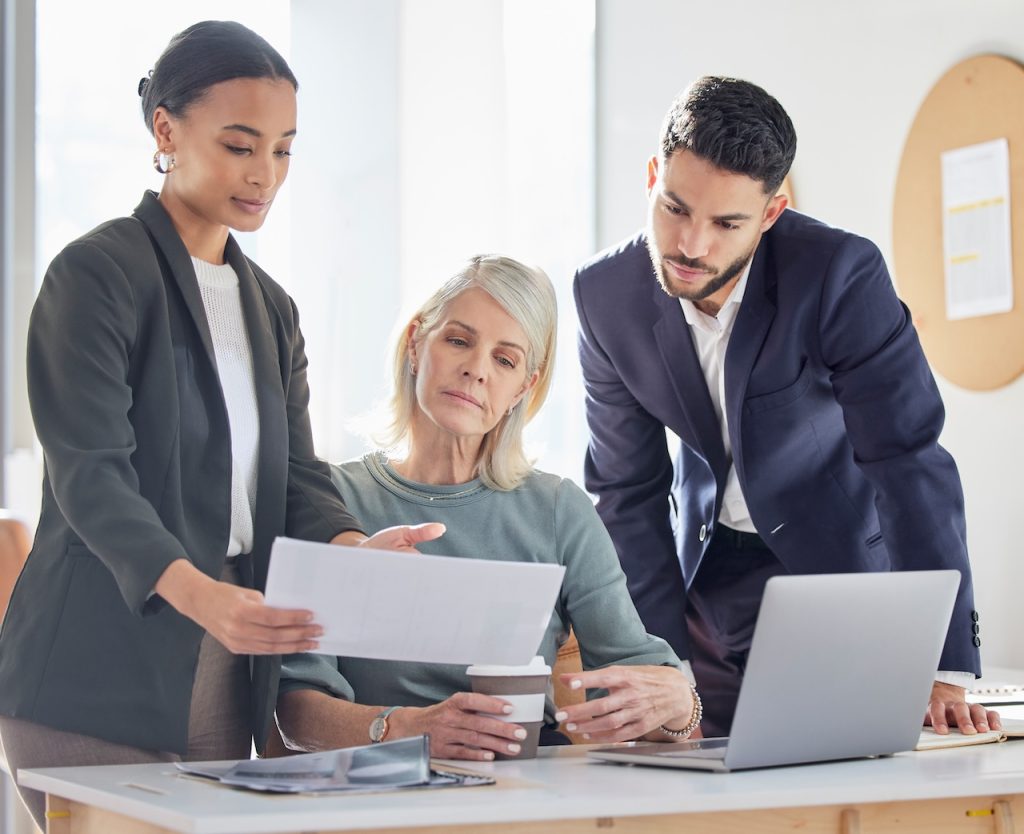 business coworkers discussing it consulting solution for their IT