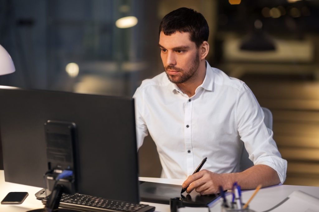 employee working in office on computer